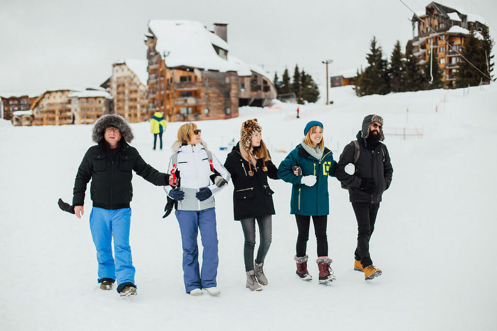 photoshoot for a family playing in the snow in Morzine Avoriaz (French Alps) on their ski holiday