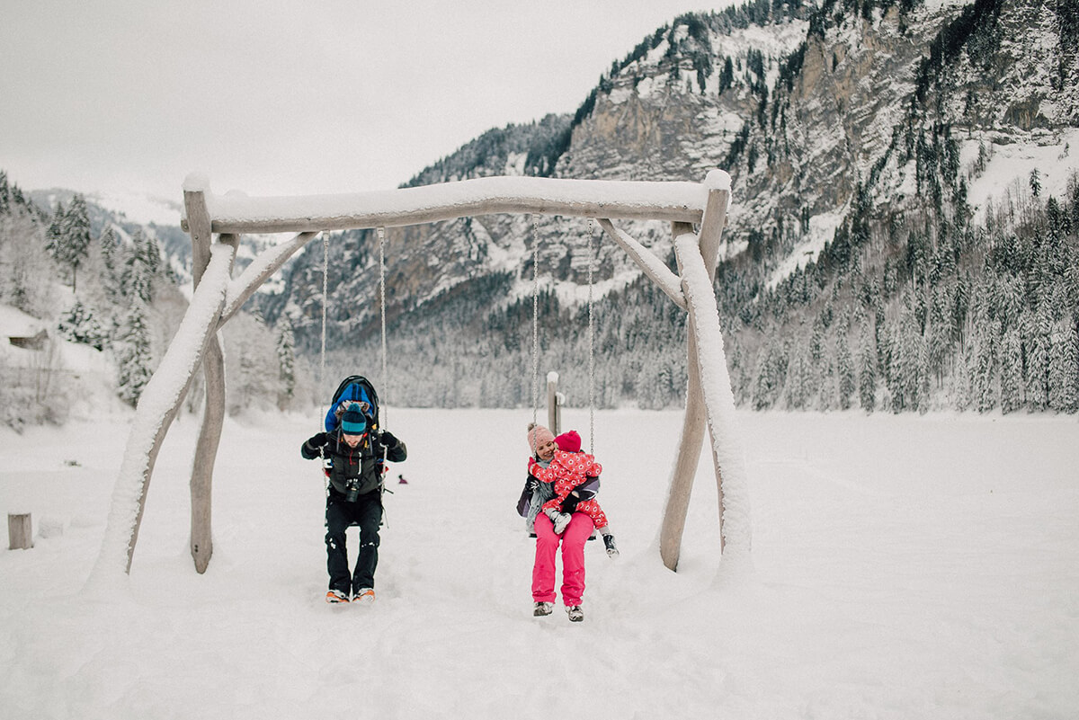 family kids sledge snow winter led gets french alps lac montriond