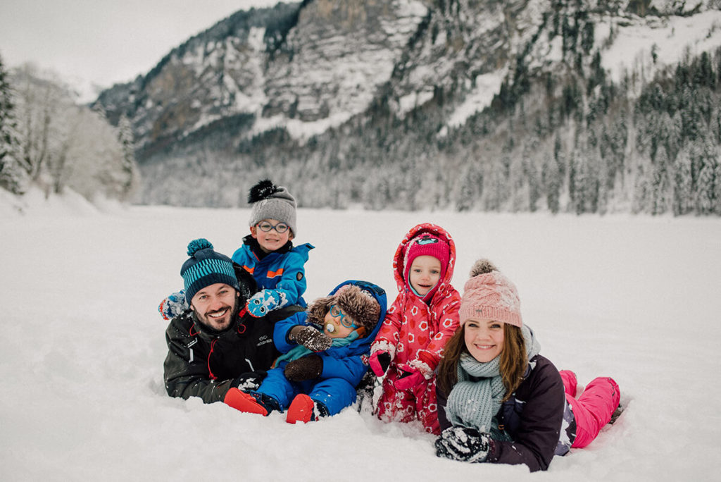 family kids sledge snow winter led gets french alps lac montriond