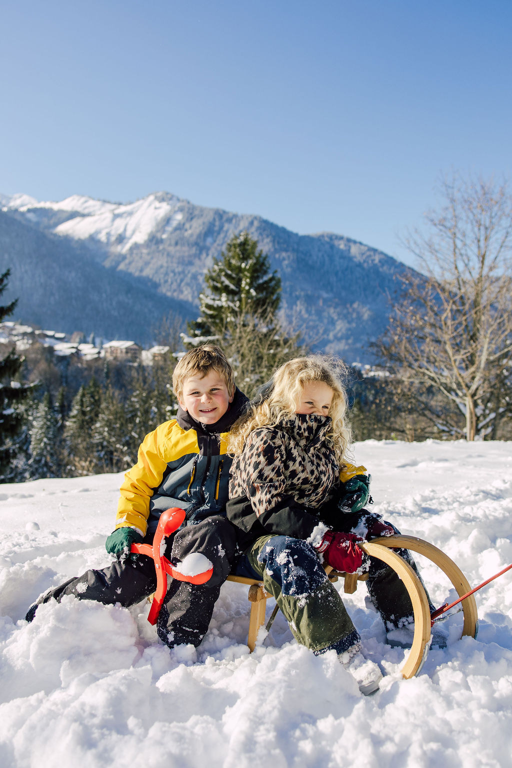Kids sledding in Morzine