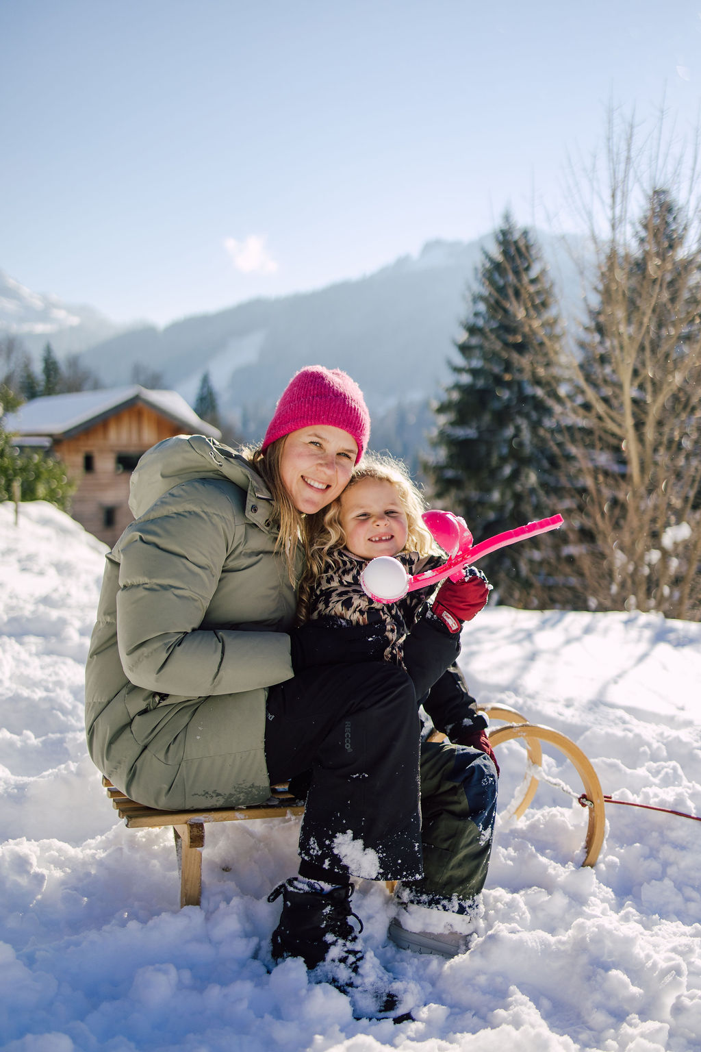 Mother and daughter portrait in snow